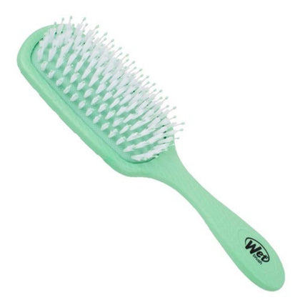 Spazzola per capelli districante La spazzola bagnata diventa verde ammorbidente