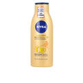 Q10+ straffende und selbstbräunende Körpermilch 400 ml-0